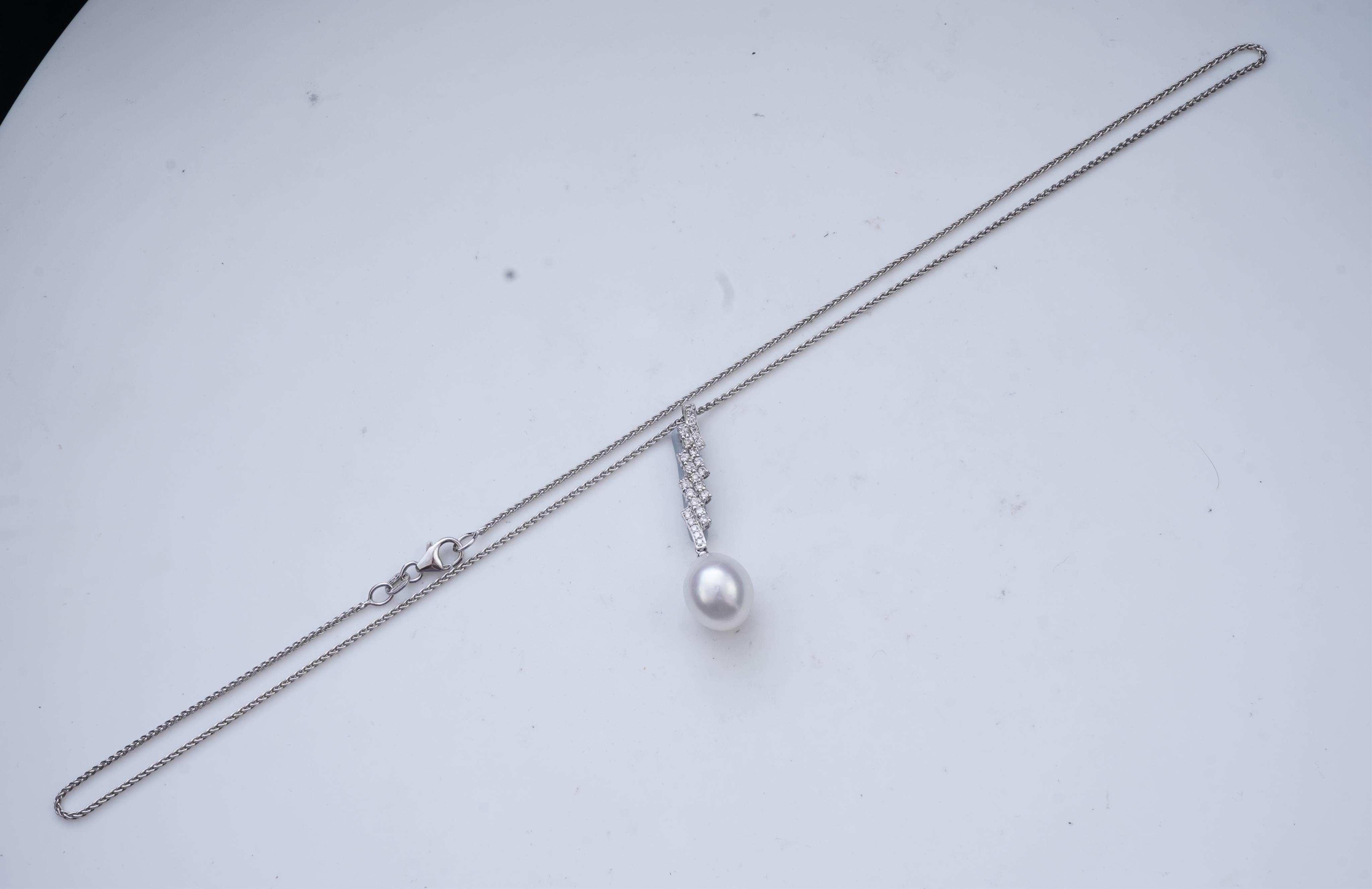 A cultured pearl and diamond demi-parure